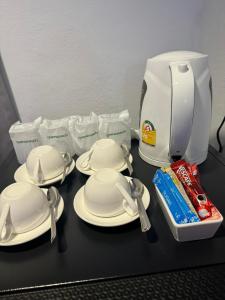 Příslušenství pro přípravu čaje a kávy v ubytování Neo Hatyai Hotel