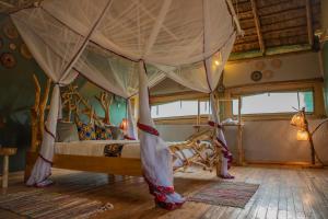 Postelja oz. postelje v sobi nastanitve Embogo Safari Lodges