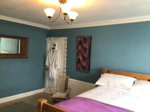 Кровать или кровати в номере Mansefield Rooms