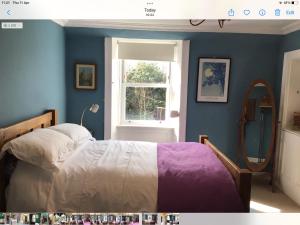 Кровать или кровати в номере Mansefield Rooms