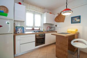 Kuchyň nebo kuchyňský kout v ubytování Apartment Giovanna 1557