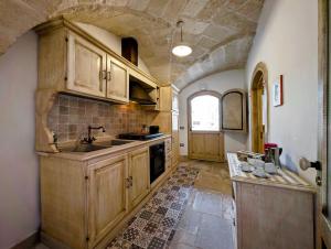 Kuchyň nebo kuchyňský kout v ubytování VinTage rooms