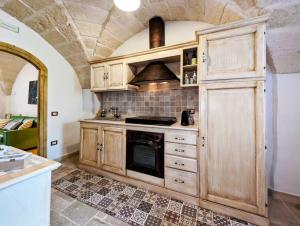 Kuchyň nebo kuchyňský kout v ubytování VinTage rooms