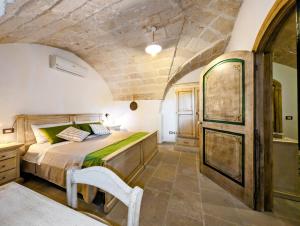 Postel nebo postele na pokoji v ubytování VinTage rooms