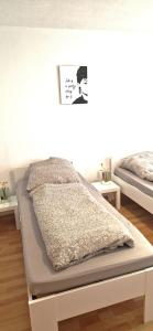 Postel nebo postele na pokoji v ubytování Apartment Sson