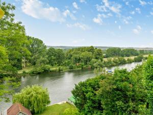 a view of a river from a house at Riverside House in Cookham