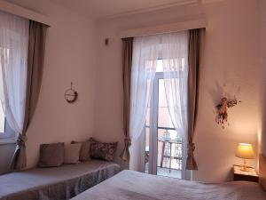 Postel nebo postele na pokoji v ubytování APARTMAN Riva 1