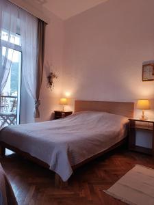 Postel nebo postele na pokoji v ubytování APARTMAN Riva 1