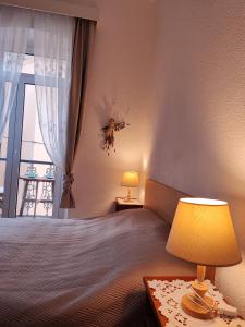 Postel nebo postele na pokoji v ubytování APARTMAN Riva 1