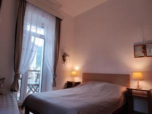 Postel nebo postele na pokoji v ubytování APARTMAN Riva 1