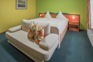 Postel nebo postele na pokoji v ubytování Hotel Ideal