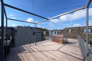 a roof deck with a view of the sky at Amazing two bedroom Penthouse in the city centre (Canal1) in Zurich