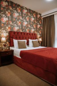 Een bed of bedden in een kamer bij Address Boutique Hotel Baku