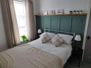Ένα ή περισσότερα κρεβάτια σε δωμάτιο στο Mrs Seeleys House