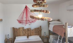 Postel nebo postele na pokoji v ubytování B&B Extremo Sud