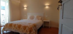 Posteľ alebo postele v izbe v ubytovaní Hostal Camponaraya