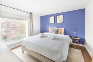 Postel nebo postele na pokoji v ubytování New Duplex 6Pers#Paris Expo#Porte de Versailles