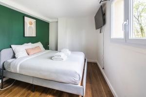 Postel nebo postele na pokoji v ubytování New Duplex 6Pers#Paris Expo#Porte de Versailles + 4 fotografie