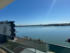 a view of a large body of water from a building at Apartments in Solid House Mamaia in Mamaia