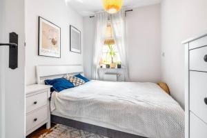 Cama o camas de una habitación en Apartament Zamojska
