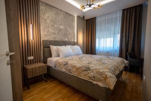 Tempat tidur dalam kamar di M3