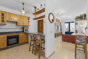 Kjøkken eller kjøkkenkrok på Famara Power Apartment
