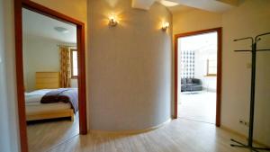 Ένα ή περισσότερα κρεβάτια σε δωμάτιο στο Apartamenty Every Sky Nadrzeczna 2B