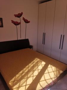 Una cama o camas en una habitación de Domus Alegra