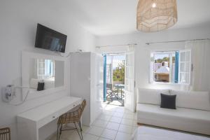 Et tv og/eller underholdning på Eutuxia Rooms & Studios