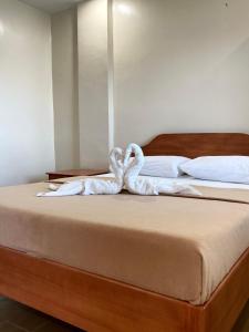 Llit o llits en una habitació de Marina Village