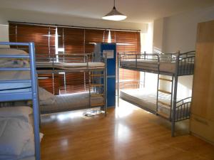Postel nebo postele na pokoji v ubytování 24/7 London Hostel