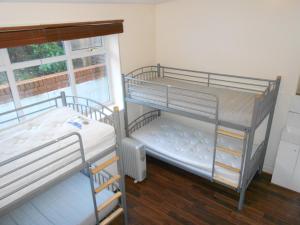 Postel nebo postele na pokoji v ubytování 24/7 London Hostel