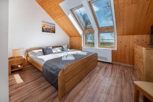 Postel nebo postele na pokoji v ubytování Golden Bridge Rooms