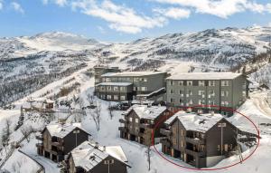 - une vue aérienne sur un complexe dans la neige dans l'établissement Lovely Apartment In Hemsedal With Sauna, à Hemsedal