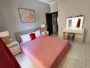 A bed or beds in a room at Marlen House Chania