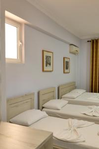 Postel nebo postele na pokoji v ubytování Hotel Billy + 37 fotografií