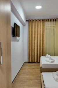Postel nebo postele na pokoji v ubytování Hotel Billy