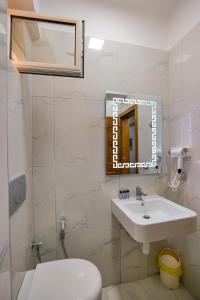 Koupelna v ubytování Hotel Billy