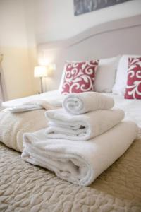 Voodi või voodid majutusasutuse Biancorèroma B&B toas