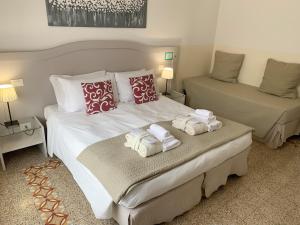 Voodi või voodid majutusasutuse Biancorèroma B&B toas