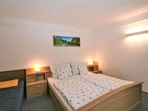 Łóżko lub łóżka w pokoju w obiekcie Apartment Kohler by Interhome