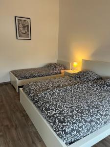 Postel nebo postele na pokoji v ubytování Apartments im Herzen von Velbert