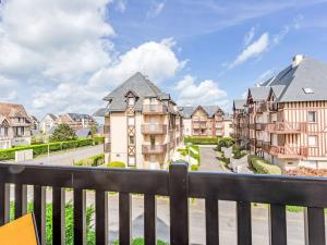a view of a apartment complex from a balcony at Apartment Le Clos Mathilde-18 by Interhome in Cabourg