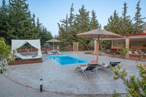 The swimming pool at or close to Physis Luxury Villa