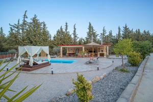 The swimming pool at or close to Physis Luxury Villa