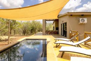 Bazén v ubytování Mamdo Bush House nebo v jeho okolí