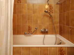 Kopalnica v nastanitvi Apartment Le Sporting 213 by Interhome