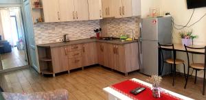 Ett kök eller pentry på tamunas apartment