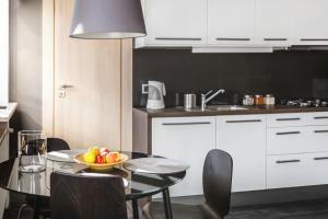 Kuchyňa alebo kuchynka v ubytovaní Stylowy apartament w najlepszej lokalizacji