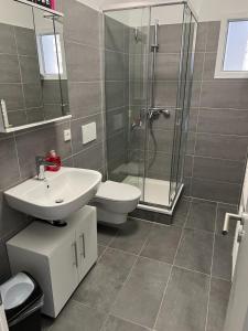 Koupelna v ubytování Apartments im Herzen von Velbert